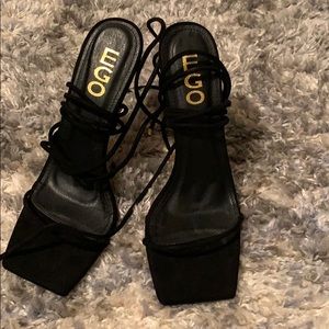 Black strapping sandals